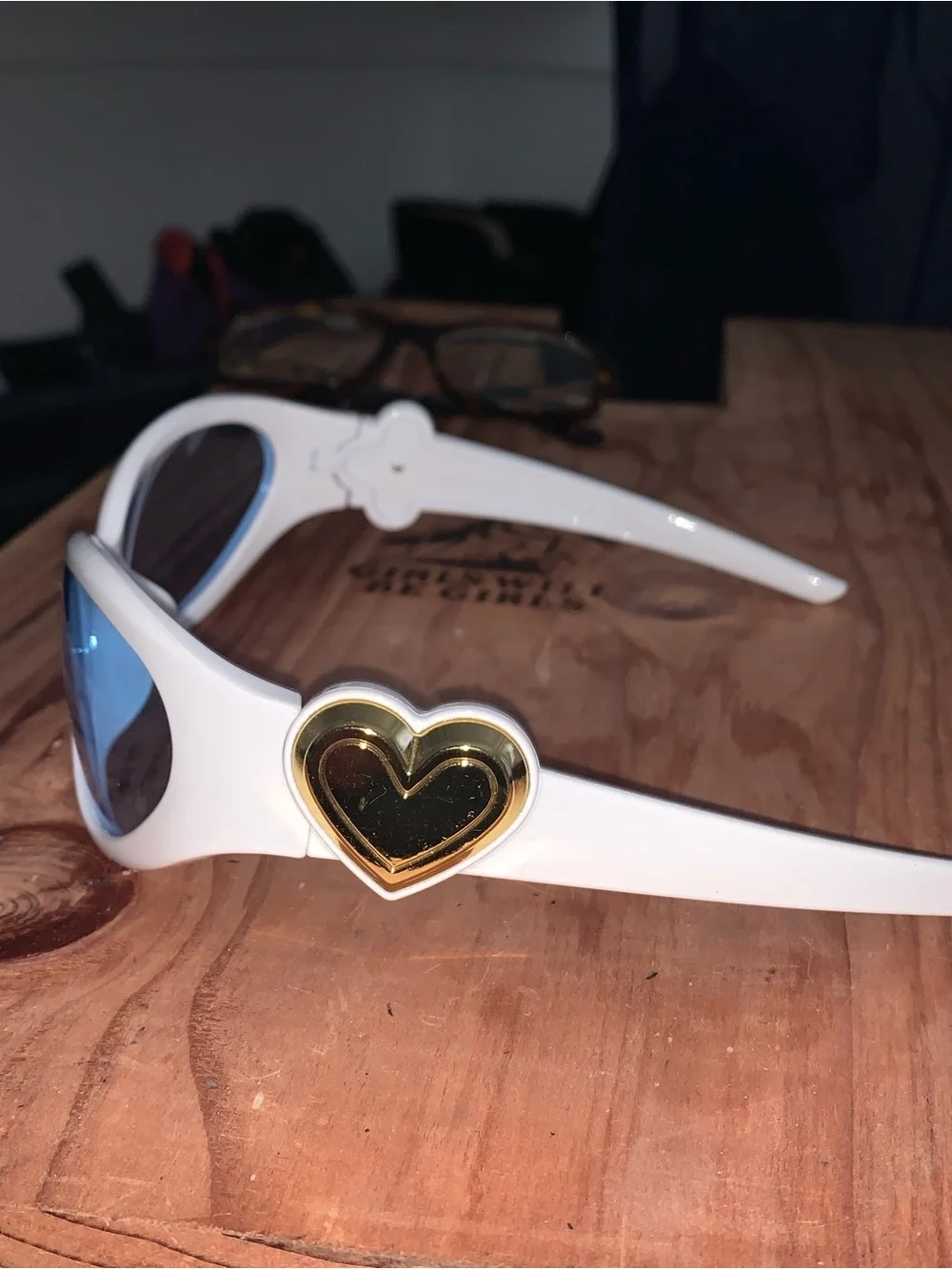 White Oval Sunglasses with Light Blue Lenses
